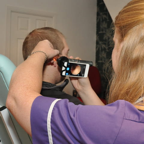 carrying out hearing test